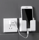 Mbajtëse Telefoni për Karikim pranë Prizës